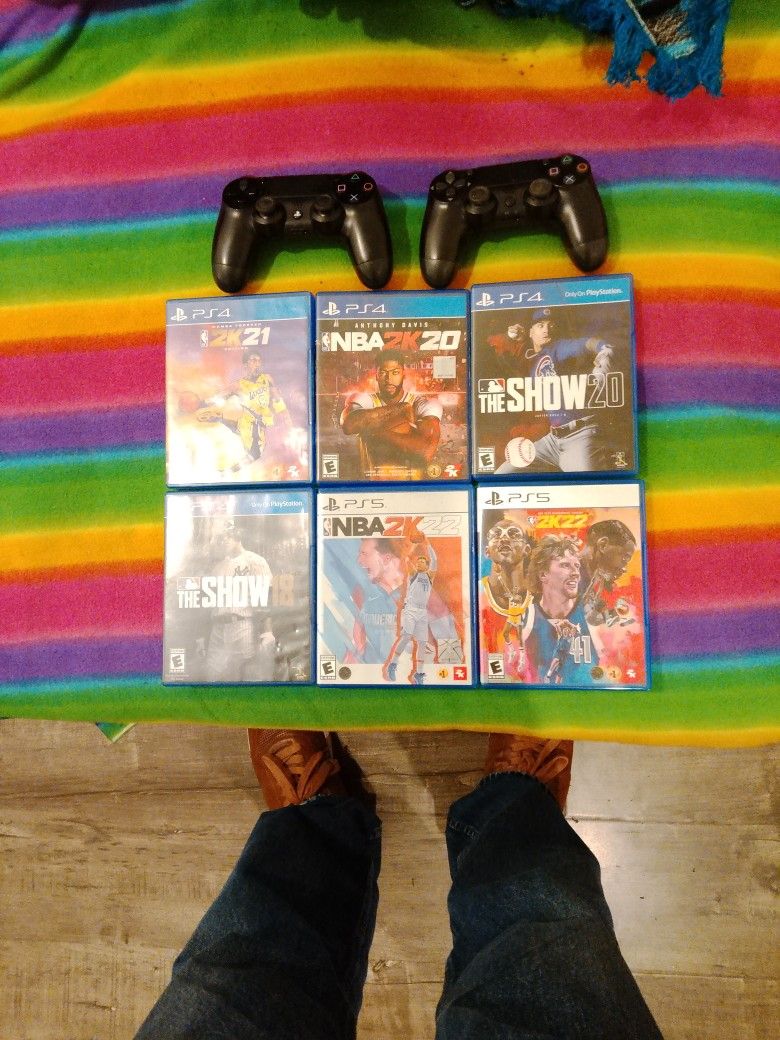 PlayStation 4 and two remotes, and two PlayStation 5 Video Games 