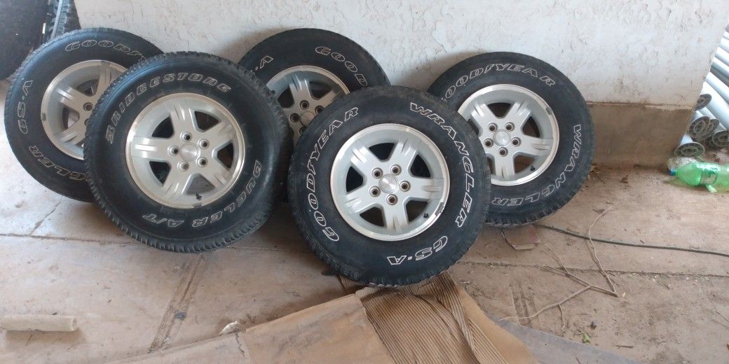 5 Stock Jeep 15-in Rims And Tires Wrangler Tires Used In Good Condition