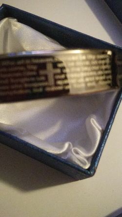 Lords Prayer stainless steel bracelet twisted wire accents in band.