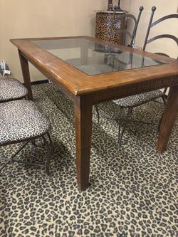 Faux wood table with glass