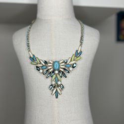 Turquoise, aqua, ivory, light, green and gold tone statement necklace  Excellent condition, please see pictures for colors of the crystal rhinestones 