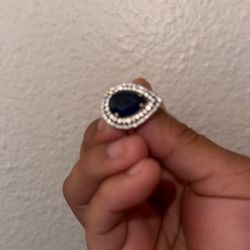 pear-shaped blue sapphire engagement ring