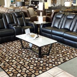 Caveman Den Power Reclining Sofa and Loveseat Set