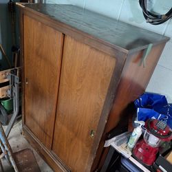 Wooden Clothing Cabinet With Sliding Doors And Good Wheels 