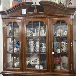 Brown china cabinet 