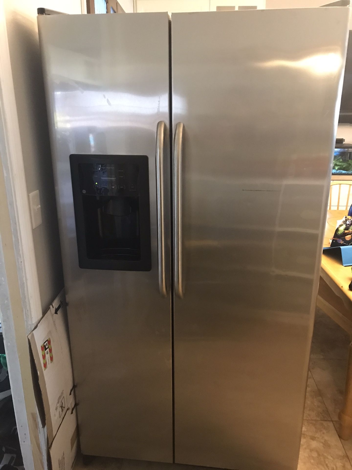 GE side by side stainless steal refrigerator