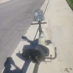 Sit down exercise bike with electronic panel