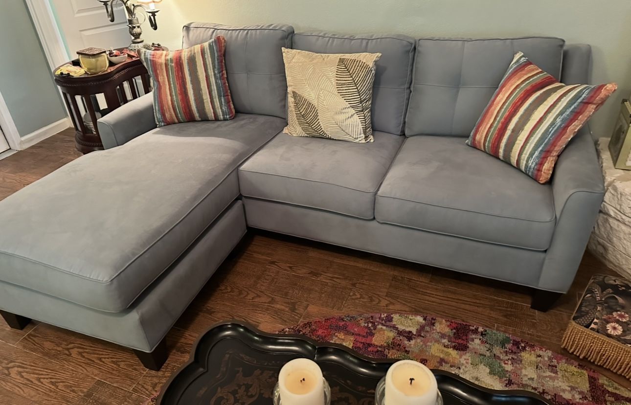 Sofa/chaise with Striped Pillows