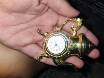 Solid brass clock teapot