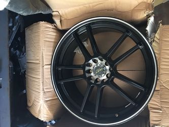 18 inch rims for sale six mouths old asking $500 I have all four they are universal five lugs