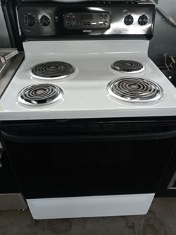 Hotpoint black and white coiltop stove - Free delivery