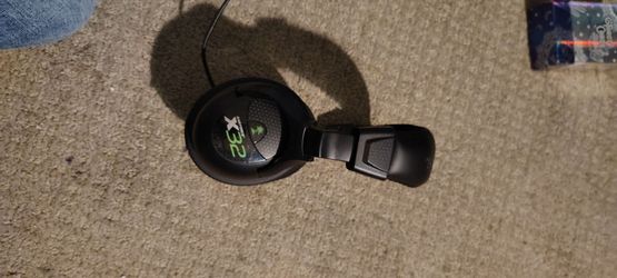 Auriculares para videos juegos de color negro con verde