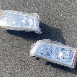 03-06 CHEVY SILVERADO HEADLIGHTS $50