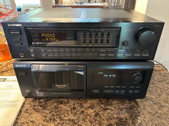 Pioneer SX-1300 Stereo receiver and Sony CDP-CX50 CD player with manuals.