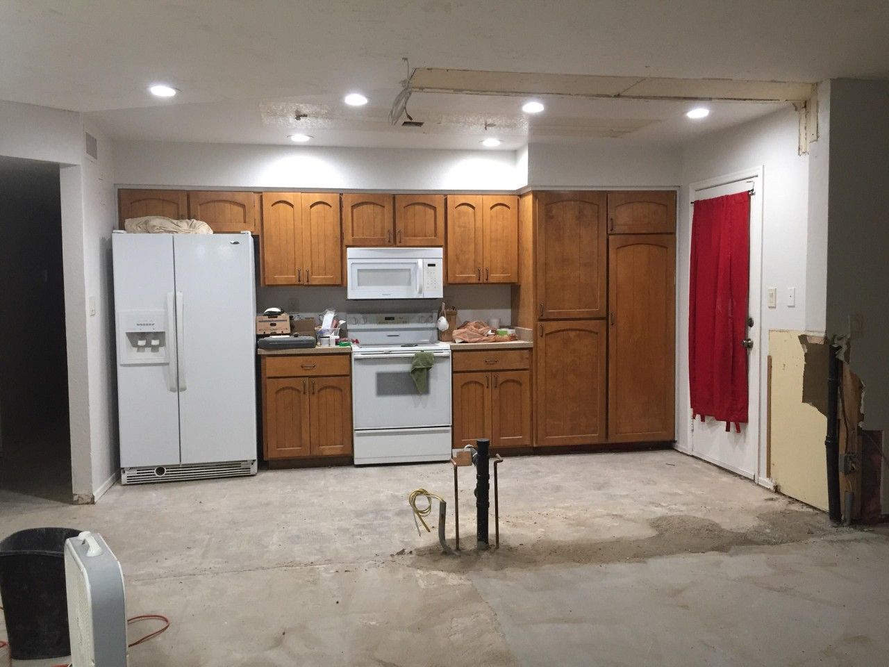 Set of 4 white appliances. Stove dishwasher refrigerator