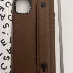 Casetify IPhone 12 Pro Max Leather case with strap to hold comfortably and acts as a phone stand. You can customize with charms (not included)  - used