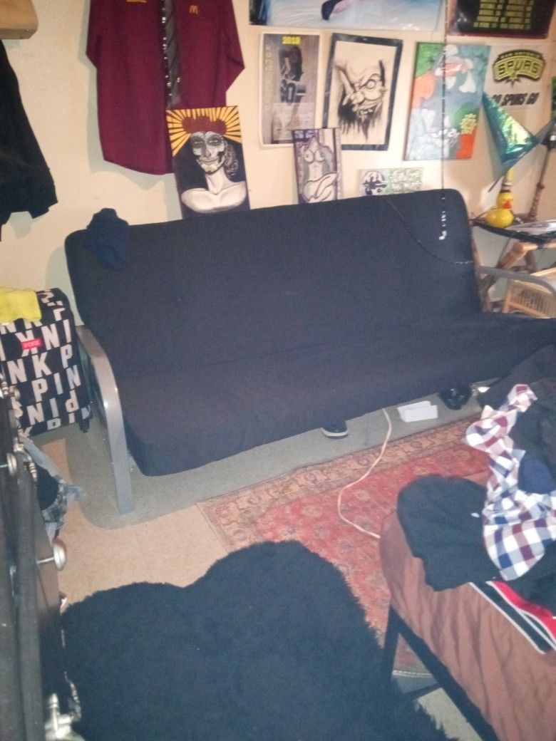 Futon( Black) With Grey Steel Frame .