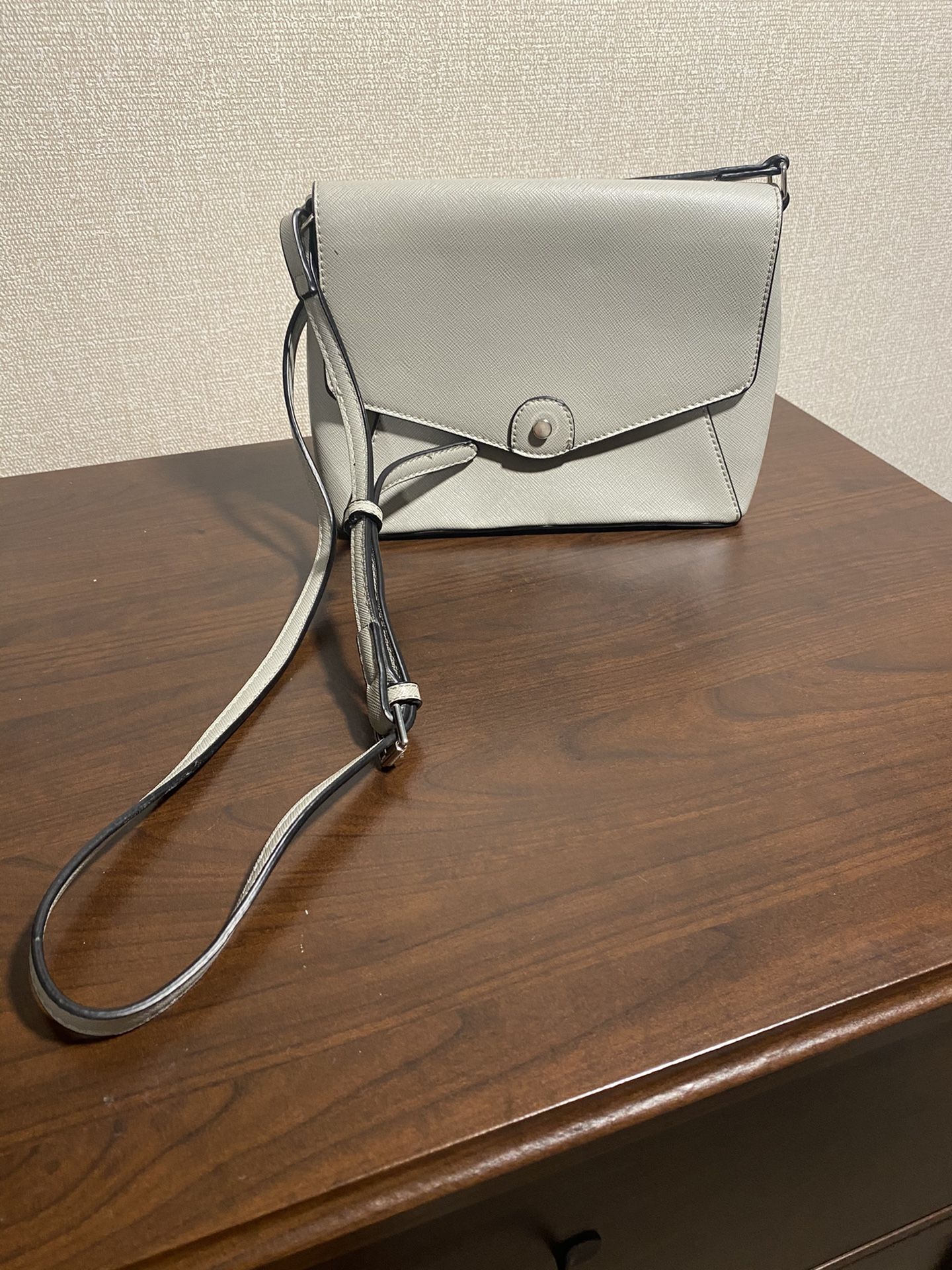 Gray cross body purse