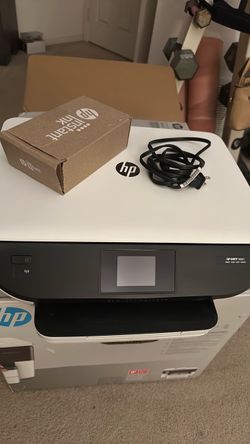 HP ENVY 5661 All-in-One Printer – $40 with  extra ink cartridges