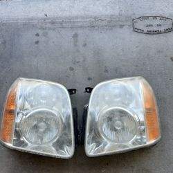 Headlights Stock 2009 GMC Yukon