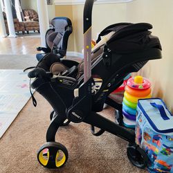 Doona™+ Infant Car Seat/Stroller with LATCH Base in Nitro/Black