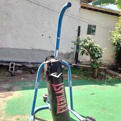 Weight Plates And Punching Bag And Bar