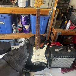Squier electric guitar with amp