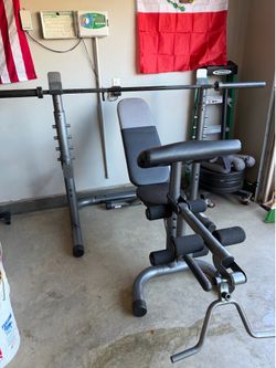 Home gym equipment - Pull up bar/squat rack, bench press with barbell