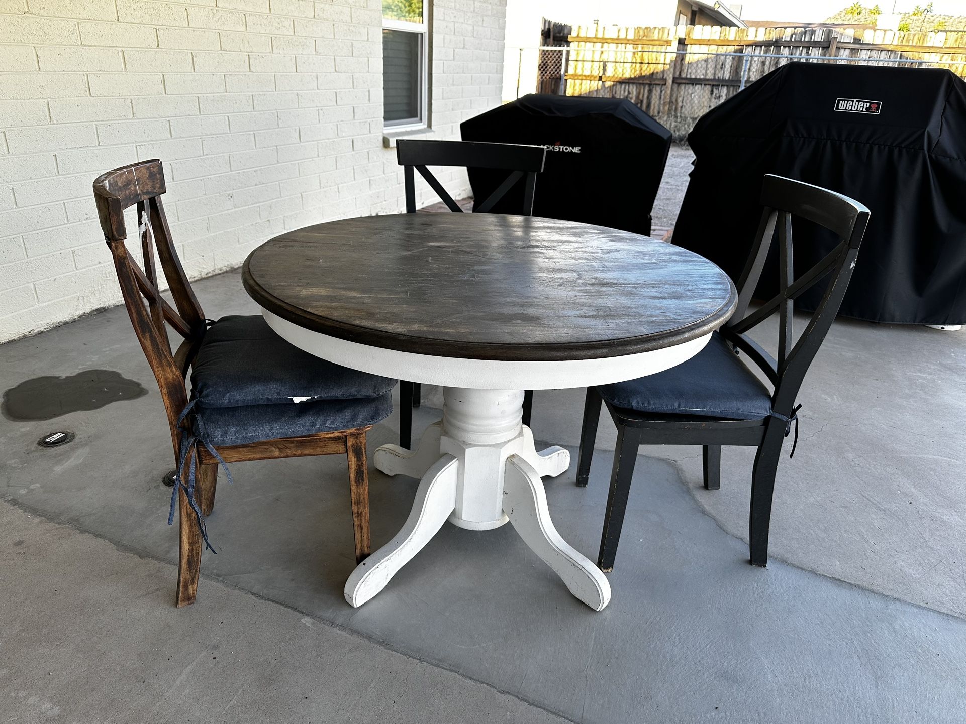 Table And Three Chairs