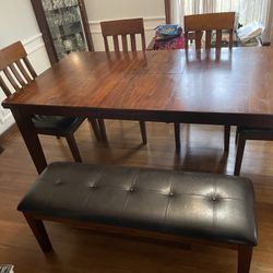 Ashley's Dining room real wood set ( seats 7 ppl) bench 