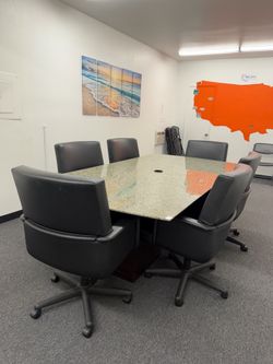 Office table with chairs in conference room