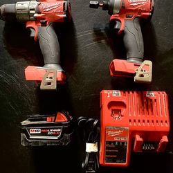 Milwaukee drill, set charger and battery