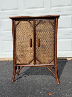 Small wood & wicker storage cabinet