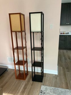 Floor lamps with shelves.