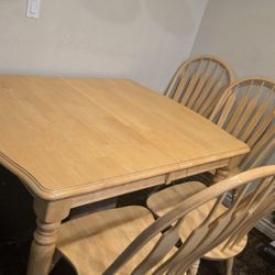 Light Wood Dining Table (52" x 42") with 4 Chairs - Perfect for a Cozy Space!