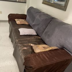 Couch: Has Cover, Is Color Of The Back Pillows