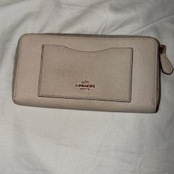             Cartera     Coach   