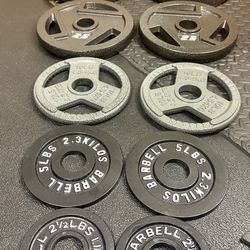 BRAND NEW Full Olympic  Weights Set of Plates: 45s, 35s, 25s, 10s, 5s and 2.5 pounders . Brute: 245 #