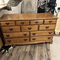 Wooden Dresser With Vanity Mirror And Broken Bed Frame 