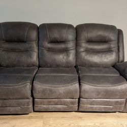 Grey Reclining Sofa – Original $3500, selling for $99