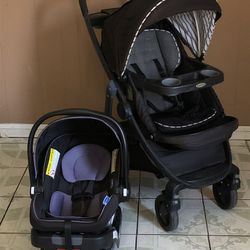 PRACTICALLY NEW GRACO MODES TRAVEL SYSTEM STROLLER CAR SEAT AND BASSINET 3 IN 1