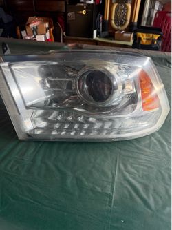 Driver side Ram 1500 Laramie headlight assembly