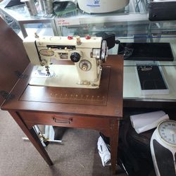 Universal sewing machine.