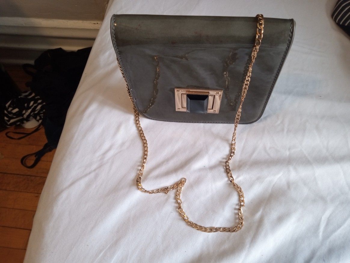 Portable Handbag With Golden Chain Hand.