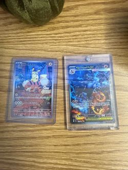 Charizard EX and Detective Pikachu