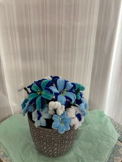Handmade pipe cleaner blue flowers