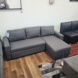 New Sectional Sleeper With Storage In Grey Or Black Leather 