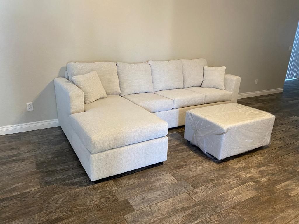 White Greyish Sectional With Ottoman