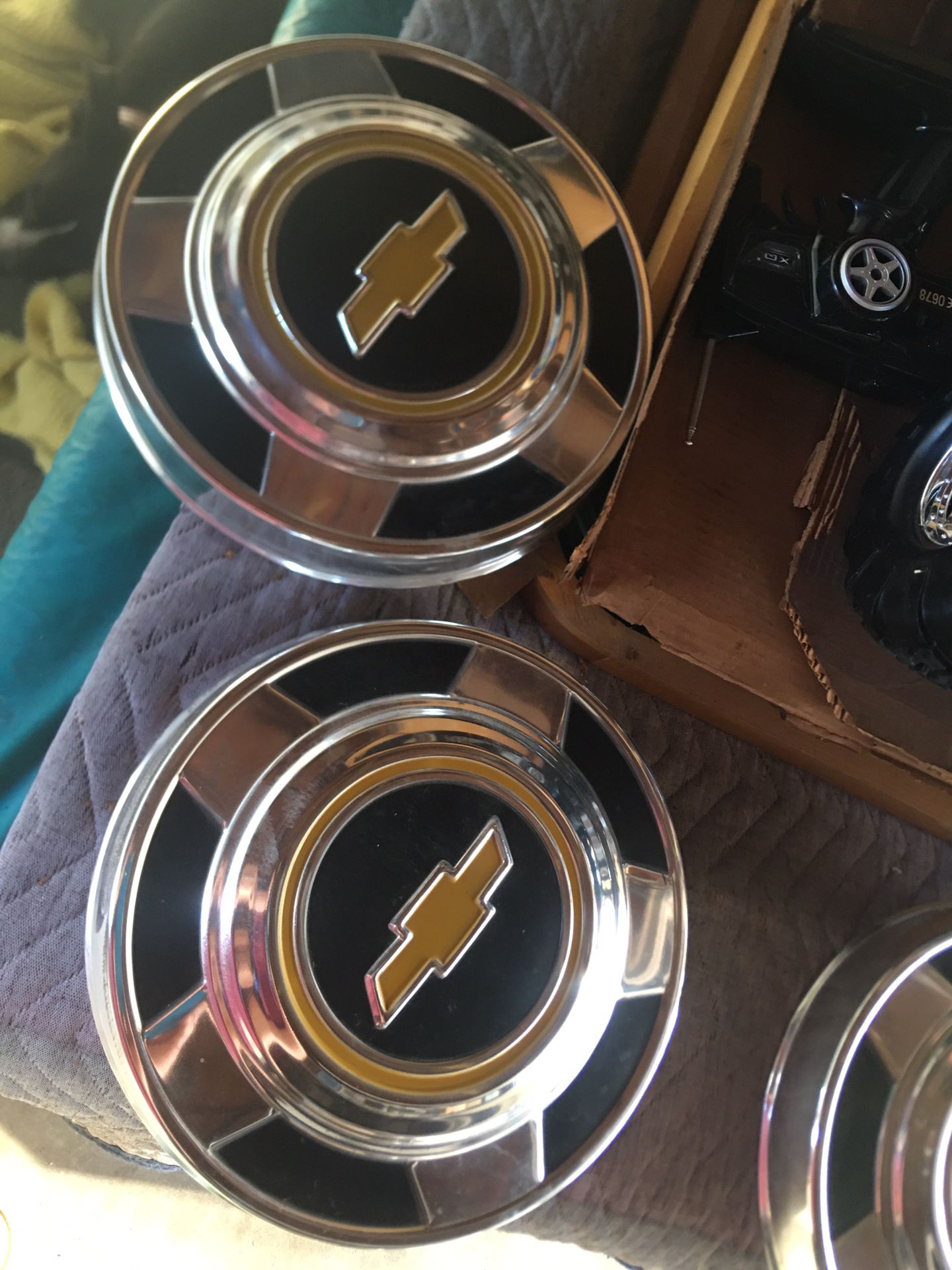 1976 Chevy truck hubcaps , parts ( price is negotiable)