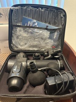 Handheld percussion massage gun Excellent condition 
